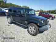 2010 Jeep Wrangler с VIN 1J4HB5H10AL126005, выставлен на аукционе Copart как лот 87035045 с пробегом 155 702 миль миль и Чистый • Clean title. История ставок и продаж доступна на DreamBid. Изображение 4.