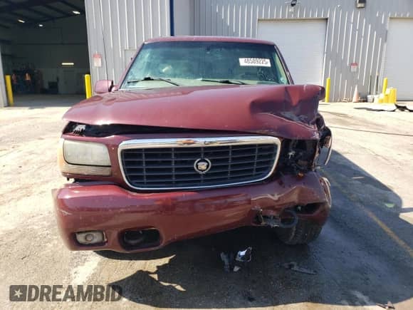 2000 Cadillac Escalade z VIN 1GYEK13R1YR123601, wystawiony jako Copart lot #48589225 z przebiegiem 258 998 mil mil oraz Szkoda całkowita • Salvage title. Historia ofert i sprzedaży dostępna na DreamBid. Obrazek 5.