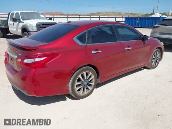 2016 Nissan Altima S with VIN 1N4AL3AP3GC127252, listed as a IAAI auction lot 42839245 with 82,041 mi miles and . Bid and sale history available at DreamBid. Image 4.