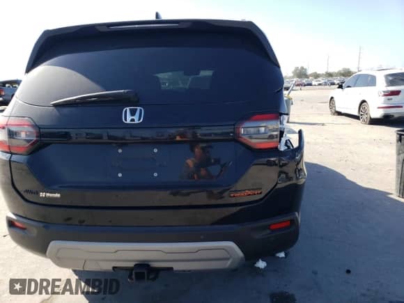 2023 Honda Pilot TrailSport with VIN 5FNYG1H66PB058087, listed as a Copart auction lot 84754824 with 26,278 mi miles and Salvage title. Bid and sale history available at DreamBid. Image 6.