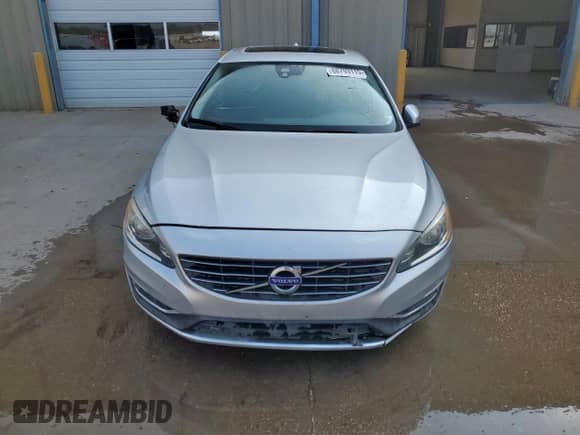 2015 Volvo S60 T5 Drive-E Premier с VIN YV126MFK4F1355600, выставлен на аукционе Copart как лот 68793115 с пробегом Не указан миль и Чистый • Clean title. История ставок и продаж доступна на DreamBid. Изображение 5.