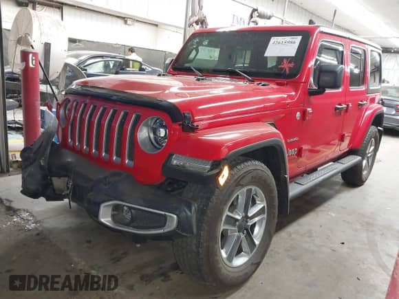2022 Jeep Wrangler Unlimited Sahara Altitude with VIN 1C4HJXEG8NW124892, listed as a IAAI auction lot 42615986 with 23,630 mi miles and . Bid and sale history available at DreamBid. Image 17.