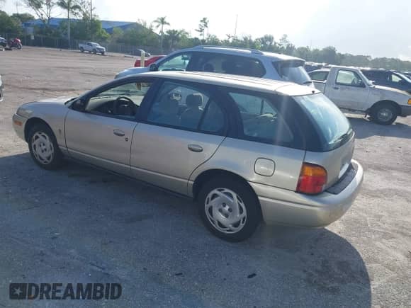 2000 Saturn SW with VIN 1G8ZN8276YZ206815, listed as a IAAI auction lot 42441078 with 176,528 mi miles and . Bid and sale history available at DreamBid. Image 3.