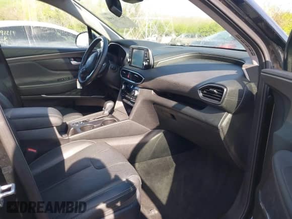 2019 Hyundai Santa Fe Ultimate с VIN 5NMS53AAXKH083541, выставлен на аукционе IAAI как лот 42081041 с пробегом 87 504 миль миль и . История ставок и продаж доступна на DreamBid. Изображение 5.