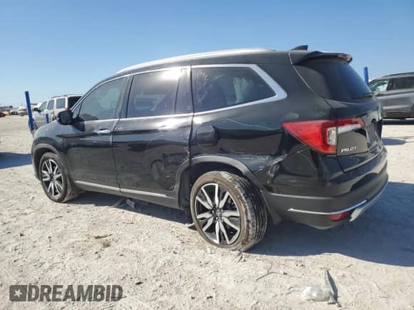 2022 Honda Pilot Touring 8-Passenger with VIN 5FNYF5H94NB004398, listed as a Copart auction lot 77202174 with 35,787 mi miles and Salvage title. Bid and sale history available at DreamBid. Image 2.
