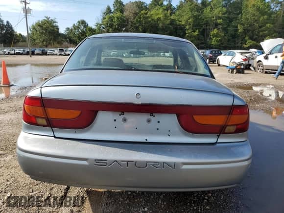 2002 Saturn SL с VIN 1G8ZK52762Z124159, выставлен на аукционе Copart как лот 70361145 с пробегом Не указан миль и Чистый • Clean title. История ставок и продаж доступна на DreamBid. Изображение 6.