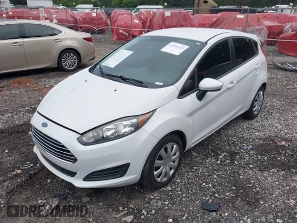 2014 Ford Fiesta S z VIN 3FADP4TJ1EM191222, wystawiony jako IAAI lot #42456575 z przebiegiem 110 969 mil mil oraz . Historia ofert i sprzedaży dostępna na DreamBid. Obrazek 2.