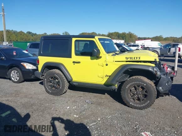 2023 Jeep Wrangler Sport with VIN 1C4GJXAN3PW505634, listed as a IAAI auction lot 43405403 with 11,925 mi miles and . Bid and sale history available at DreamBid. Image 13.