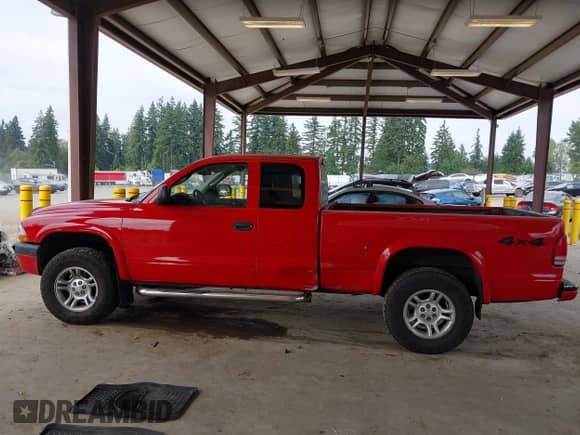 2003 Dodge Dakota with VIN 1D7HG32X93S146809, listed as a IAAI auction lot 43208367 with 215,080 mi miles and . Bid and sale history available at DreamBid. Image 15.