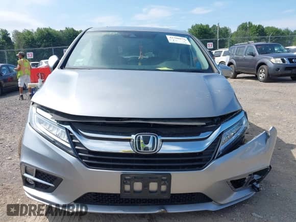 2018 Honda Odyssey Elite z VIN 5FNRL6H99JB070314, wystawiony jako IAAI lot #42708078 z przebiegiem Nie podano mil oraz . Historia ofert i sprzedaży dostępna na DreamBid. Obrazek 12.
