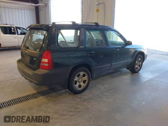 2003 Subaru Forester X with VIN JF1SG63633H720539, listed as a IAAI auction lot 43332862 with 305,928 mi miles and . Bid and sale history available at DreamBid. Image 4.