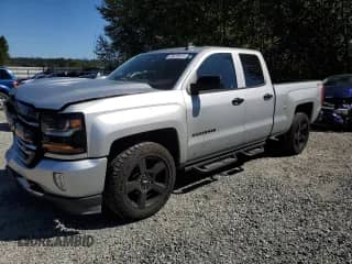 2017 Chevrolet Silverado 1500 LT with VIN 1GCVKREH2HZ352085, listed as a Copart auction lot 69423615 with 227,392 mi miles and Salvage title. Bid and sale history available at DreamBid. Image 1.