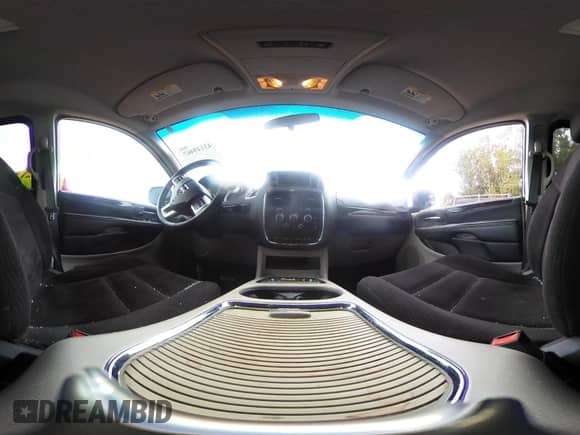 2014 Dodge Grand Caravan SXT with VIN 2C4RDGCG7ER291753, listed as a IAAI auction lot 43149467 with 111,617 mi miles and . Bid and sale history available at DreamBid. Image 18.