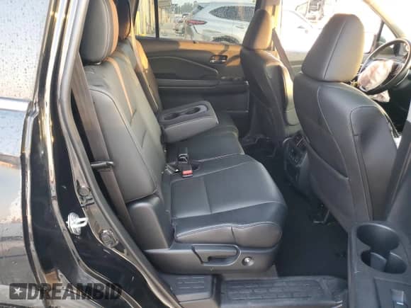 2021 Honda Pilot Special Edition z VIN 5FNYF6H2XMB070431, wystawiony jako Copart lot #69357975 z przebiegiem 50 224 mil mil oraz Szkoda całkowita • Salvage title. Historia ofert i sprzedaży dostępna na DreamBid. Obrazek 11.