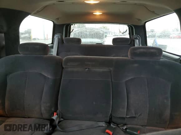 2000 Chevrolet Suburban LT z VIN 3GNFK16T7YG150665, wystawiony jako Copart lot #76552064 z przebiegiem 214 608 mil mil oraz Szkoda całkowita • Salvage title. Historia ofert i sprzedaży dostępna na DreamBid. Obrazek 10.