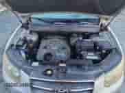 2007 Hyundai Santa Fe SE z VIN 5NMSH13E77H128423, wystawiony jako Copart lot #82700565 z przebiegiem 219 545 mil mil oraz Czysty tytuł • Clean title. Historia ofert i sprzedaży dostępna na DreamBid. Obrazek 12.