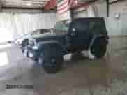 2012 Jeep Wrangler Sport with VIN 1C4AJWAG4CL215593, listed as a Copart auction lot 71013325 with 112,333 mi miles and Salvage title. Bid and sale history available at DreamBid. Image 1.