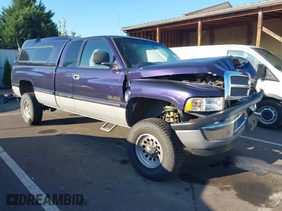 1999 Dodge 2500 with VIN 1B7KF2366XJ583021, listed as a IAAI auction lot 43278220 with 298,863 mi miles and . Bid and sale history available at DreamBid. Image 1.
