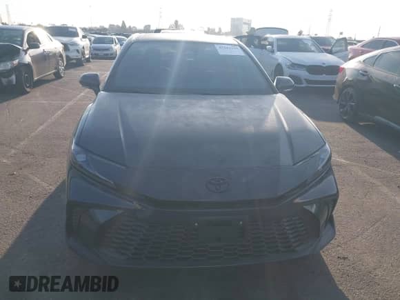 2025 Toyota Camry SE with VIN 4T1DAACK3SU592440, listed as a IAAI auction lot 43243159 with 7,671 mi miles and . Bid and sale history available at DreamBid. Image 12.