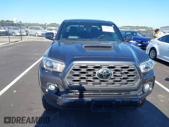 2020 Toyota Tacoma SR5 with VIN 3TMCZ5AN8LM296929, listed as a IAAI auction lot 43118349 with 68,020 mi miles and . Bid and sale history available at DreamBid. Image 13.