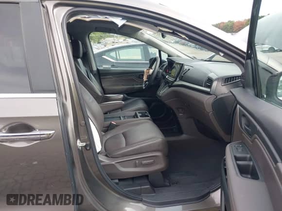 2020 Honda Odyssey EX-L with VIN 5FNRL6H77LB026765, listed as a IAAI auction lot 43328922 with 39,757 mi miles and . Bid and sale history available at DreamBid. Image 5.