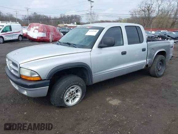 2003 Dodge Dakota Sport with VIN 1D7HG38X13S267227, listed as a IAAI auction lot 41952281 with 119,641 mi miles and . Bid and sale history available at DreamBid. Image 2.