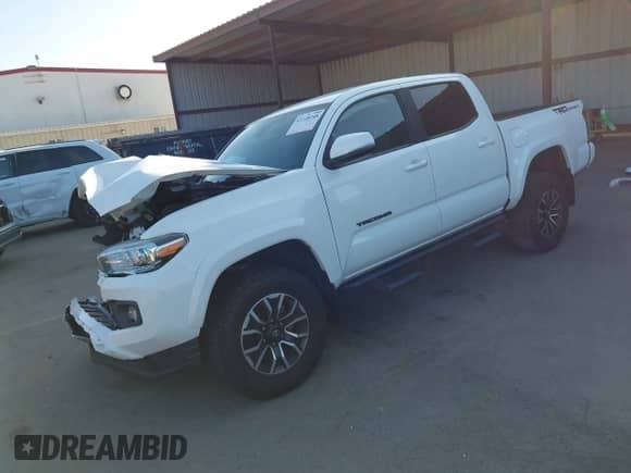 2021 Toyota Tacoma SR5 with VIN 3TMAZ5CN7MM146297, listed as a IAAI auction lot 43348248 with 46,809 mi miles and . Bid and sale history available at DreamBid. Image 18.