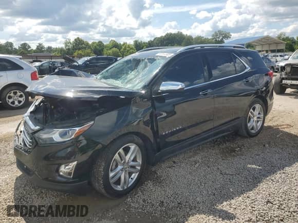 2019 Chevrolet Equinox Premier with VIN 3GNAXNEV9KL209297, listed as a Copart auction lot 64791585 with 105,810 mi miles and Salvage title. Bid and sale history available at DreamBid. Image 1.