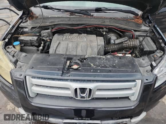 2006 Honda Pilot EX-L с VIN 5FNYF28676B039491, выставлен на аукционе Copart как лот 62075565 с пробегом 140 943 миль миль и Списание • Salvage title. История ставок и продаж доступна на DreamBid. Изображение 11.