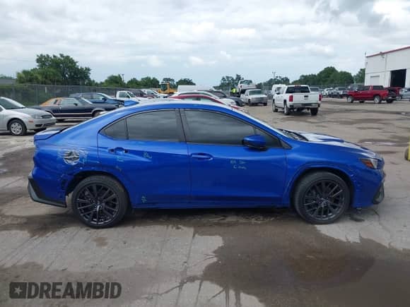 2023 Subaru WRX Premium с VIN JF1VBAF62P9823106, выставлен на аукционе IAAI как лот 42364780 с пробегом 12 537 миль миль и . История ставок и продаж доступна на DreamBid. Изображение 14.