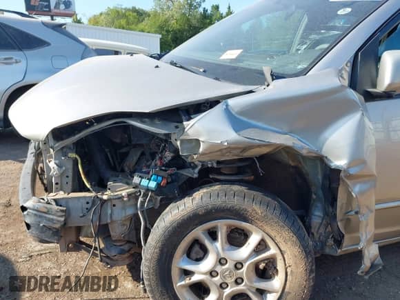 2005 Toyota Sienna XLE Limited with VIN 5TDZA22C75S289728, listed as a IAAI auction lot 43248565 with Not provided miles and . Bid and sale history available at DreamBid. Image 6.