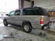 2001 Chevrolet Suburban LS z VIN 3GNEC16T01G210929, wystawiony jako Copart lot #72276304 z przebiegiem 317 653 mil mil oraz Szkoda całkowita • Salvage title. Historia ofert i sprzedaży dostępna na DreamBid. Obrazek 2.