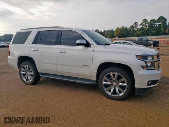2017 Chevrolet Tahoe LT with VIN 1GNSCBKC1HR318114, listed as a Copart auction lot 69377665 with 159,591 mi miles and Salvage title. Bid and sale history available at DreamBid. Image 4.