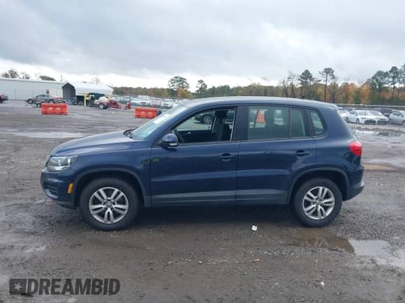 2014 Volkswagen Tiguan S with VIN WVGAV3AX7EW626163, listed as a IAAI auction lot 43591364 with 198,283 mi miles and . Bid and sale history available at DreamBid. Image 14.