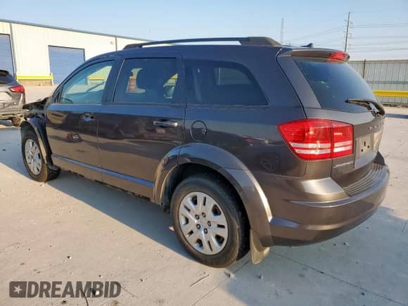 2016 Dodge Journey SE with VIN 3C4PDCAB1GT146523, listed as a Copart auction lot 71865515 with 111,657 mi miles and Salvage title. Bid and sale history available at DreamBid. Image 2.