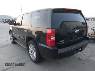 2009 Chevrolet Tahoe with VIN 1GNFC13549R122701, listed as a IAAI auction lot 42939816 with 211,564 mi miles and . Bid and sale history available at DreamBid. Image 3.