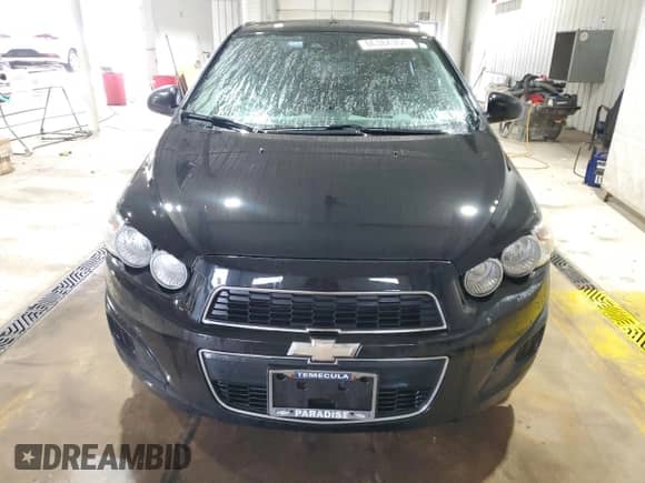 2016 Chevrolet Sonic LT z VIN 1G1JC5SB5G4142606, wystawiony jako Copart lot #86384364 z przebiegiem 76 200 mil mil oraz Szkoda całkowita • Salvage title. Historia ofert i sprzedaży dostępna na DreamBid. Obrazek 5.