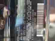 2013 Hyundai Veloster w/Black Int z VIN KMHTC6AD2DU153014, wystawiony jako Copart lot #84975285 z przebiegiem 128 446 mil mil oraz Szkoda całkowita • Salvage title. Historia ofert i sprzedaży dostępna na DreamBid. Obrazek 14.