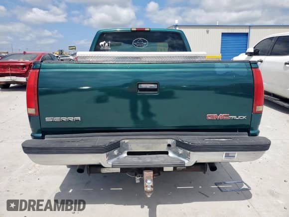 1997 GMC Sierra 1500 z VIN 2GTEC19R9V1544545, wystawiony jako Copart lot #61717075 z przebiegiem 212 464 mil mil oraz Czysty tytuł • Clean title. Historia ofert i sprzedaży dostępna na DreamBid. Obrazek 6.