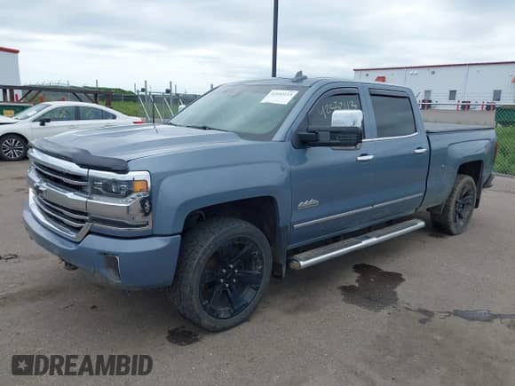 2016 Chevrolet Silverado 1500 High Country z VIN 3GCUKTEC2GG235957, wystawiony jako IAAI lot #42532113 z przebiegiem 116 193 mil mil oraz . Historia ofert i sprzedaży dostępna na DreamBid. Obrazek 18.