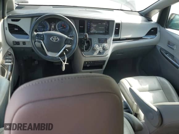 2015 Toyota Sienna XLE with VIN 5TDYK3DC7FS567248, listed as a Copart auction lot 80903245 with 143,175 mi miles and Salvage title. Bid and sale history available at DreamBid. Image 8.
