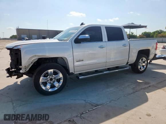 2017 Chevrolet Silverado 1500 LTZ with VIN 3GCPCSECXHG145834, listed as a Copart auction lot 65348985 with 153,460 mi miles and Salvage title. Bid and sale history available at DreamBid. Image 1.