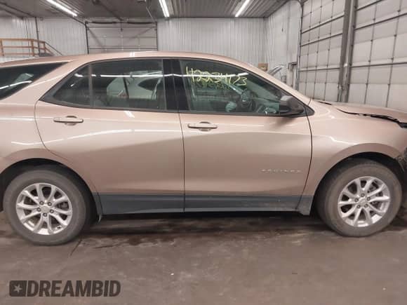 2019 Chevrolet Equinox LS with VIN 2GNAXHEV7K6199391, listed as a IAAI auction lot 42234173 with 106,275 mi miles and . Bid and sale history available at DreamBid. Image 14.