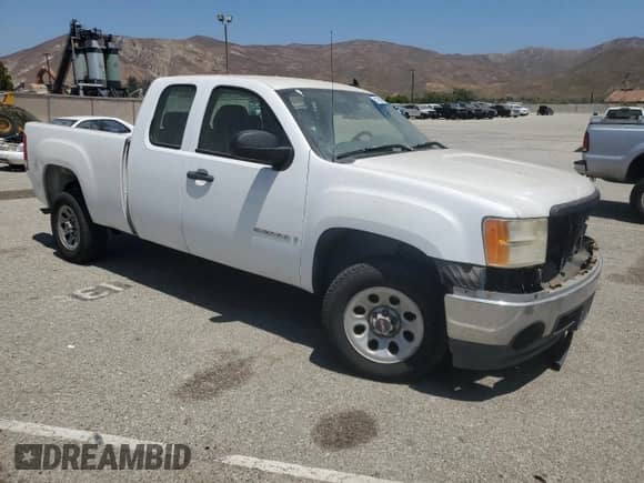 2007 GMC Sierra 1500 SLE1 with VIN 2GTEC19C271605281, listed as a Copart auction lot 63796285 with 114,415 mi miles and Salvage title. Bid and sale history available at DreamBid. Image 4.