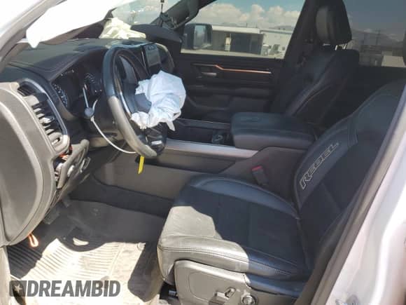 2021 Ram 1500 Rebel z VIN 1C6SRFLT0MN538169, wystawiony jako Copart lot #80576935 z przebiegiem 129 462 mil mil oraz Szkoda całkowita • Salvage title. Historia ofert i sprzedaży dostępna na DreamBid. Obrazek 7.