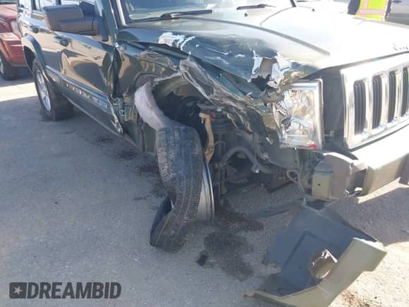 2007 Jeep Commander Sport with VIN 1J8HH48K67C533772, listed as a IAAI auction lot 41033399 with 295,552 mi miles and . Bid and sale history available at DreamBid. Image 6.