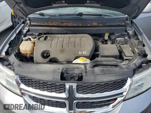 2017 Dodge Journey SXT with VIN 3C4PDCBG3HT536597, listed as a Copart auction lot 69964525 with 128,638 mi miles and Salvage title. Bid and sale history available at DreamBid. Image 12.