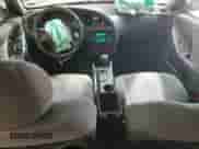 2005 Hyundai Elantra GLS z VIN KMHDN46D65U035786, wystawiony jako Copart lot #70865764 z przebiegiem 277 993 mil mil oraz Szkoda całkowita • Salvage title. Historia ofert i sprzedaży dostępna na DreamBid. Obrazek 8.