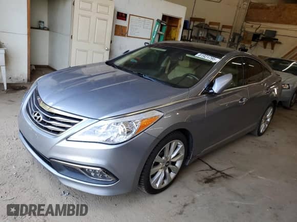 2015 Hyundai Azera Limited с VIN KMHFH4JG2FA483964, выставлен на аукционе Copart как лот 81921795 с пробегом 125 208 миль миль и Списание • Salvage title. История ставок и продаж доступна на DreamBid. Изображение 1.