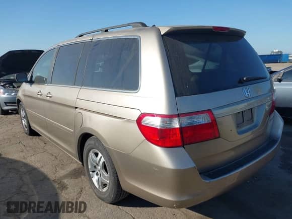 2005 Honda Odyssey EX z VIN 5FNRL38425B012621, wystawiony jako IAAI lot #43421590 z przebiegiem 216 566 mil mil oraz . Historia ofert i sprzedaży dostępna na DreamBid. Obrazek 3.